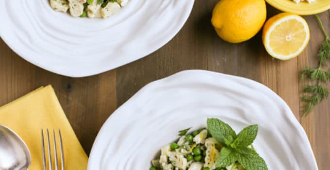 Light and Herby Mediterranean Pasta Salad | Lemon, Feta, and Fresh Chopped Herbs make this a light and delicious side dish! A tangy vinaigrette dressing ties it all together...yum! Great with any grilled meats or seafood! | WorldofPastabilities.com