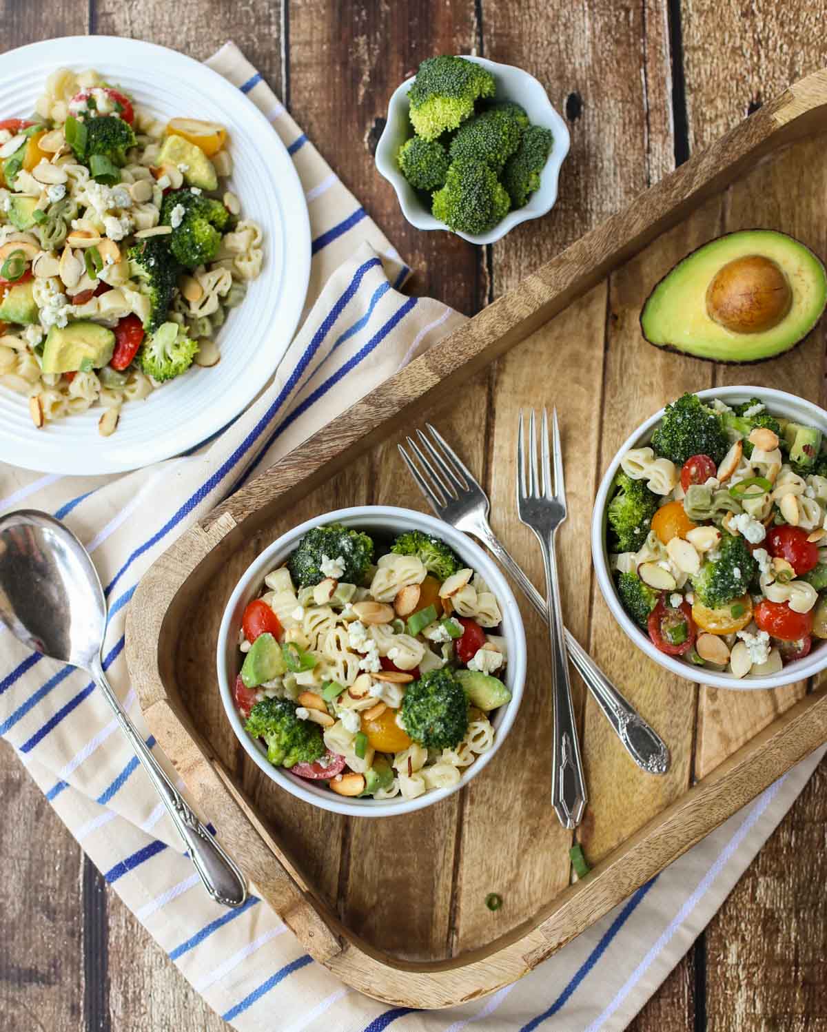 Blue Cheese Pasta Salad | Your favorite blue cheese veggies like cherry tomatoes and crunchy broccoli with toasted almonds and avocado! All tossed in a yummy blue cheese vinaigrette. Substitute feta for a lighter taste. Yum! | WorldofPastabilities.com