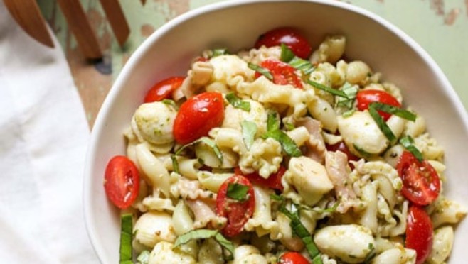 Caprese Pasta Salad | WorldofPastabilities.com | The perfect summer salad is fresh, simple, and a crowd favorite! You'll make this over and over!