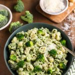 Close up of Creamy Broccoli Pasta in Bowl with ingredients around