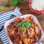Homemade Gnocchi with Chunky Meat Sauce | WorldofPastabilities.com | Light and fluffy pillows of yumminess served with a chunky meat and sausage sauce. Easy to make - no special equipment needed!