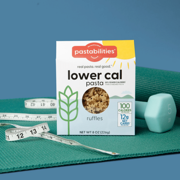 lower cal pasta box with yoga mat, weights and measuring tape