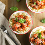 Mini Ricotta Meatballs with Herbed Tomato Suace| WorldofPastabilities.com | Moist, delicious, super simple recipe that they entire family will LOVE! Easy to freeze for later too!