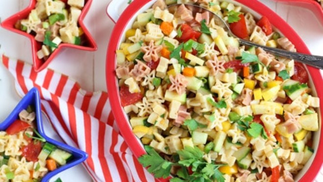 Fresh & Light Veggie Pasta Salad with Spicy Lemon Dressing | A light but flavorful dish featuring diced veggies and delicious pasta! Great with grilled meats or BBQ | WorldofPastabilities.com