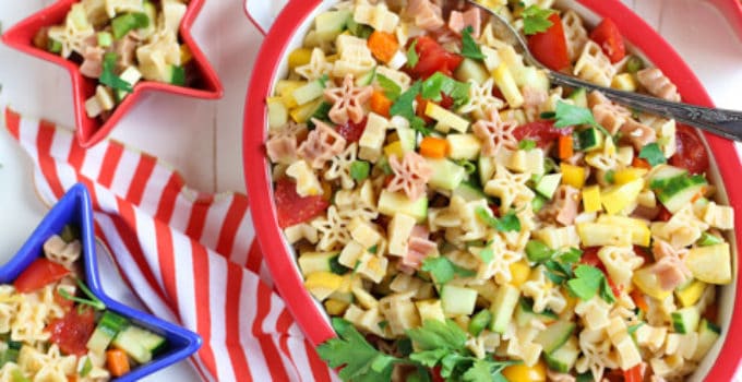 Fresh & Light Veggie Pasta Salad with Spicy Lemon Dressing | A light but flavorful dish featuring diced veggies and delicious pasta! Great with grilled meats or BBQ | WorldofPastabilities.com