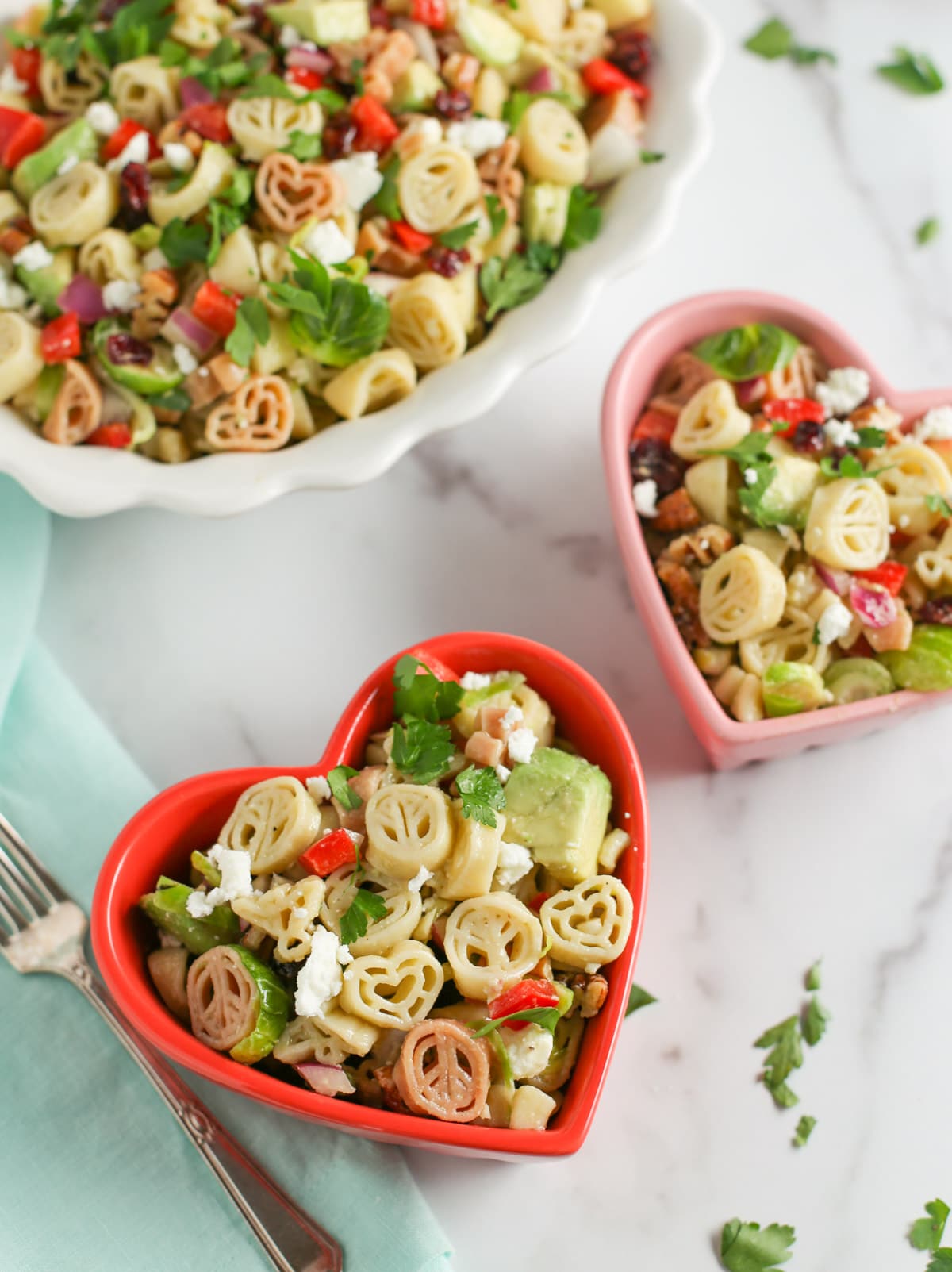 Two heart shaped bowls with Winter Pasta Salad