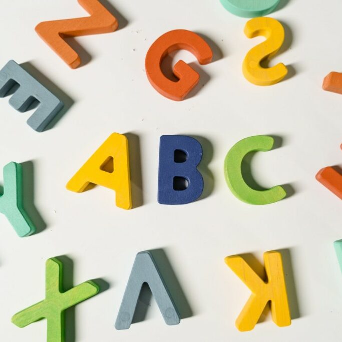 colorful block letters spelling abc