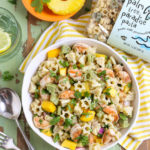 Group shot of Caribbean Pasta Salad with fresh pineapple and pasta bag