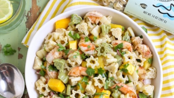 Group shot of Caribbean Pasta Salad with fresh pineapple and pasta bag