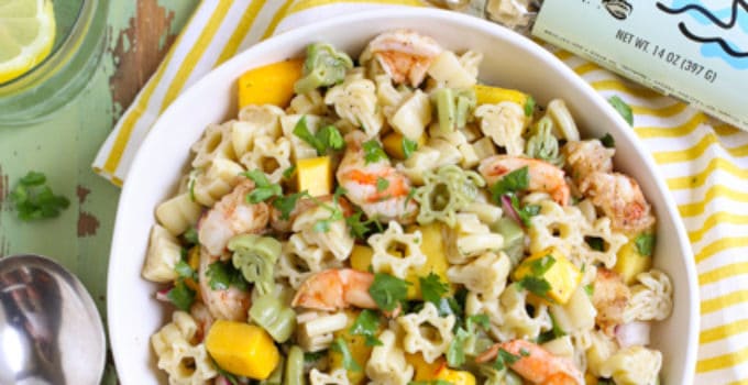 Group shot of Caribbean Pasta Salad with fresh pineapple and pasta bag