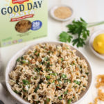 Toasted Nut and Feta Pasta in Bowl next to Good Day Pasta Box
