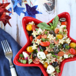 Supreme Pizza Pasta Salad | Delish combo of your favorite pizza ingredients! A simple side dish to any summer menu. Yum! The vinaigrette dressing ties it all together! | WorldofPastabilities.com