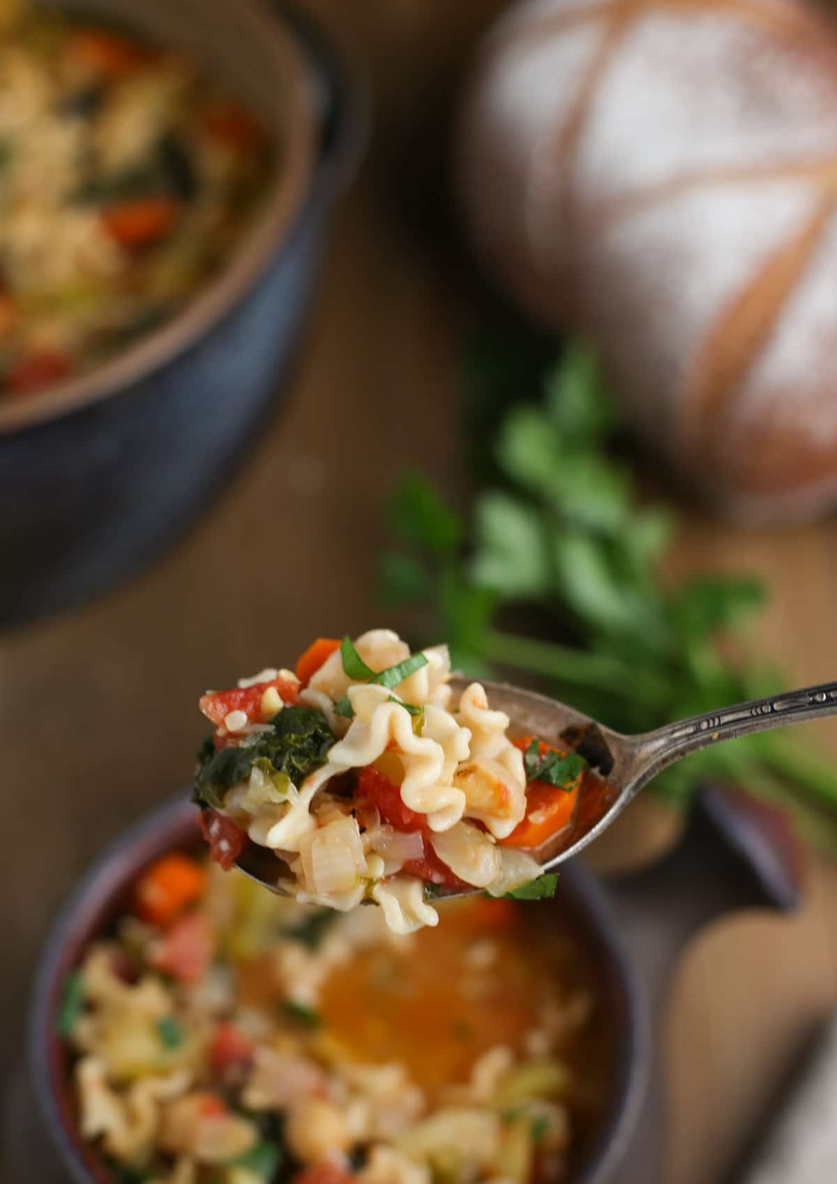 Close up shot of Mighty Minestrone Soup on spoon